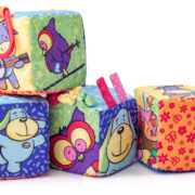 NINY Baby kostky textilní s aktivitami set 4ks v tašce na zip pro miminko