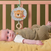 TAF TOYS Baby lev Harry textilní hudební natahovací s melodií pro miminko
